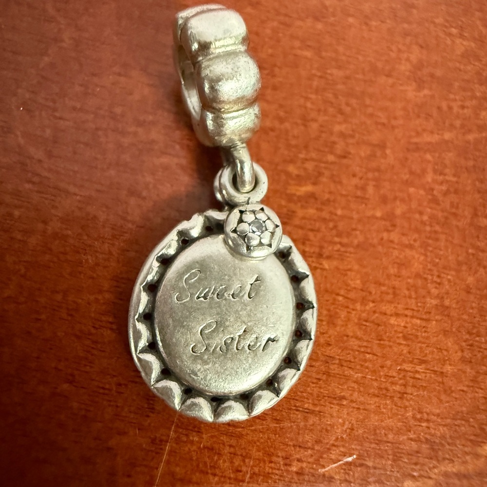 Pandora silver Sweet Sister dangle charm.